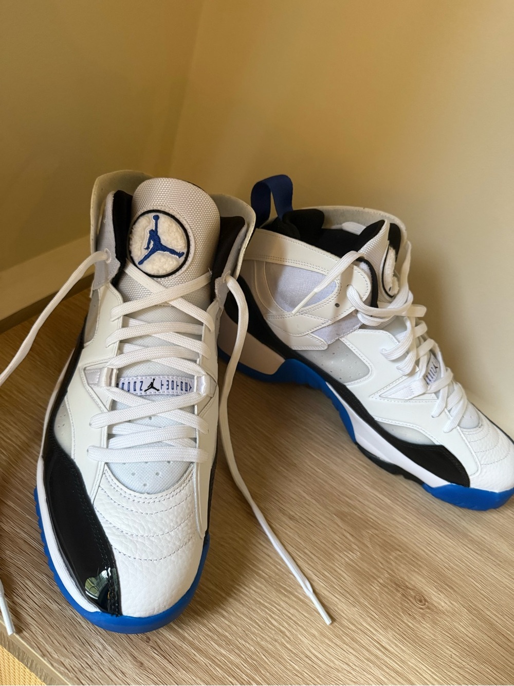 Jordan Retro High-Top Sneakers in White, Black & Blue